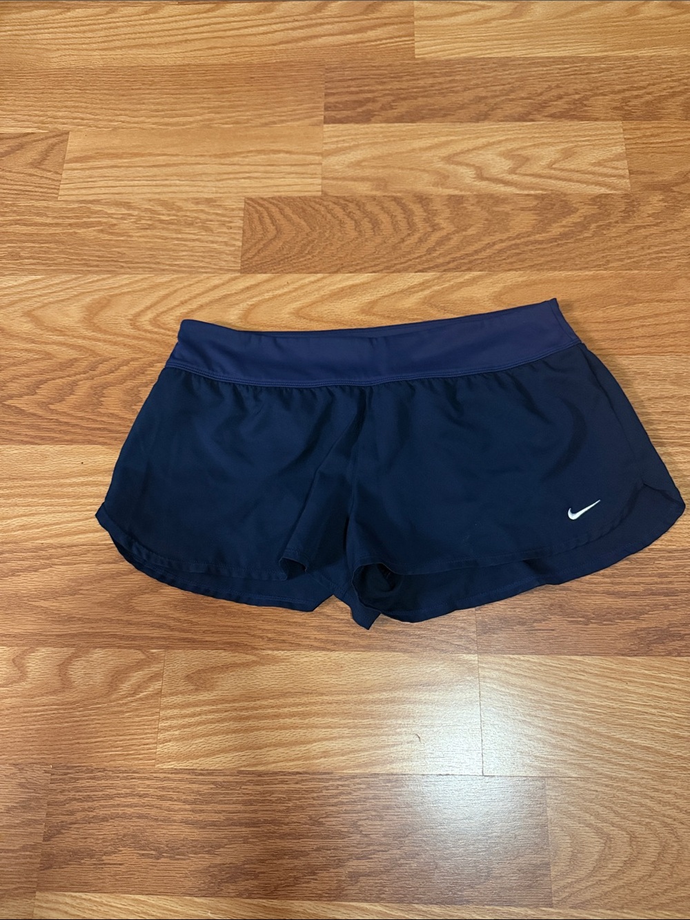 Nike Women's Dark Navy Athletic Shorts with White Swoosh